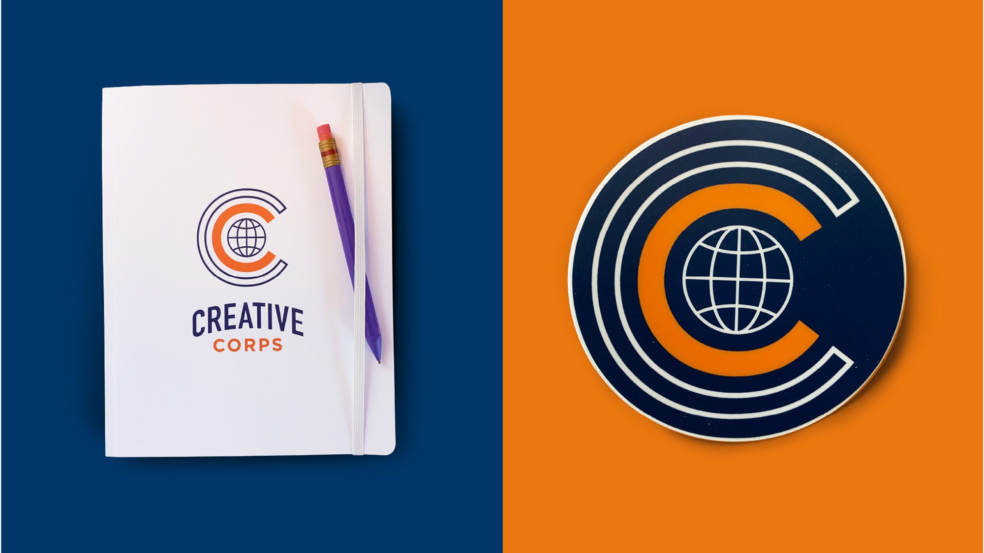 Notebook labeled “CREATIVE CORPS” beside a circular C-and-globe emblem.